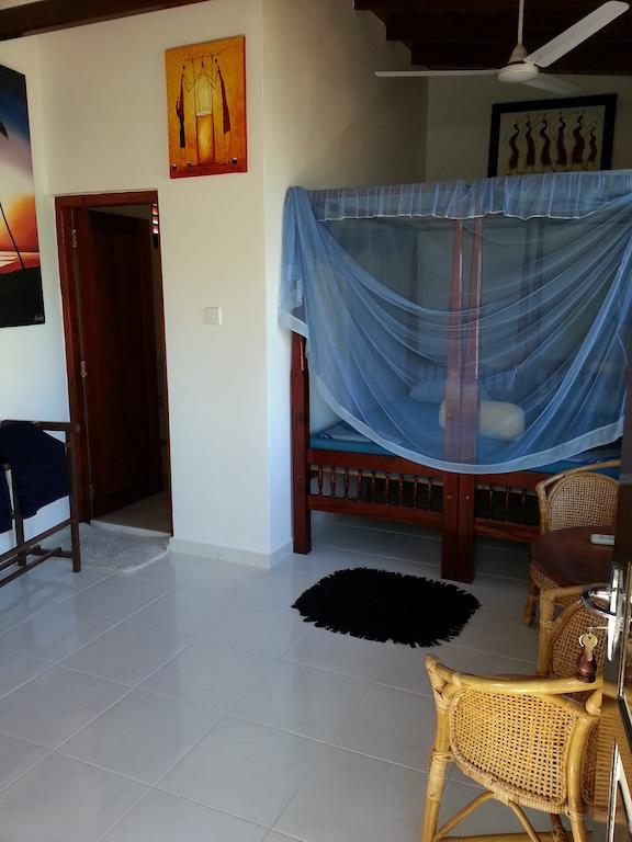 Main Reef Guest House Хикадува Стая снимка
